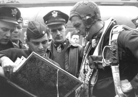 An image of James Stewart discussing a mission